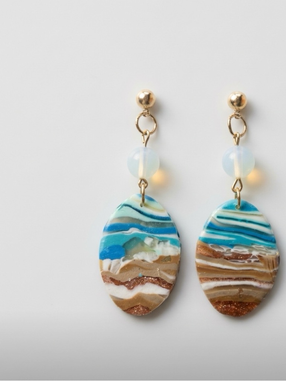 Ocean-inspired dangle earrings
